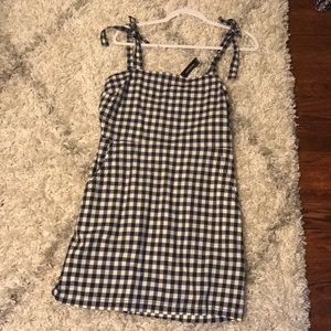 Navy blue and white gingham print dress